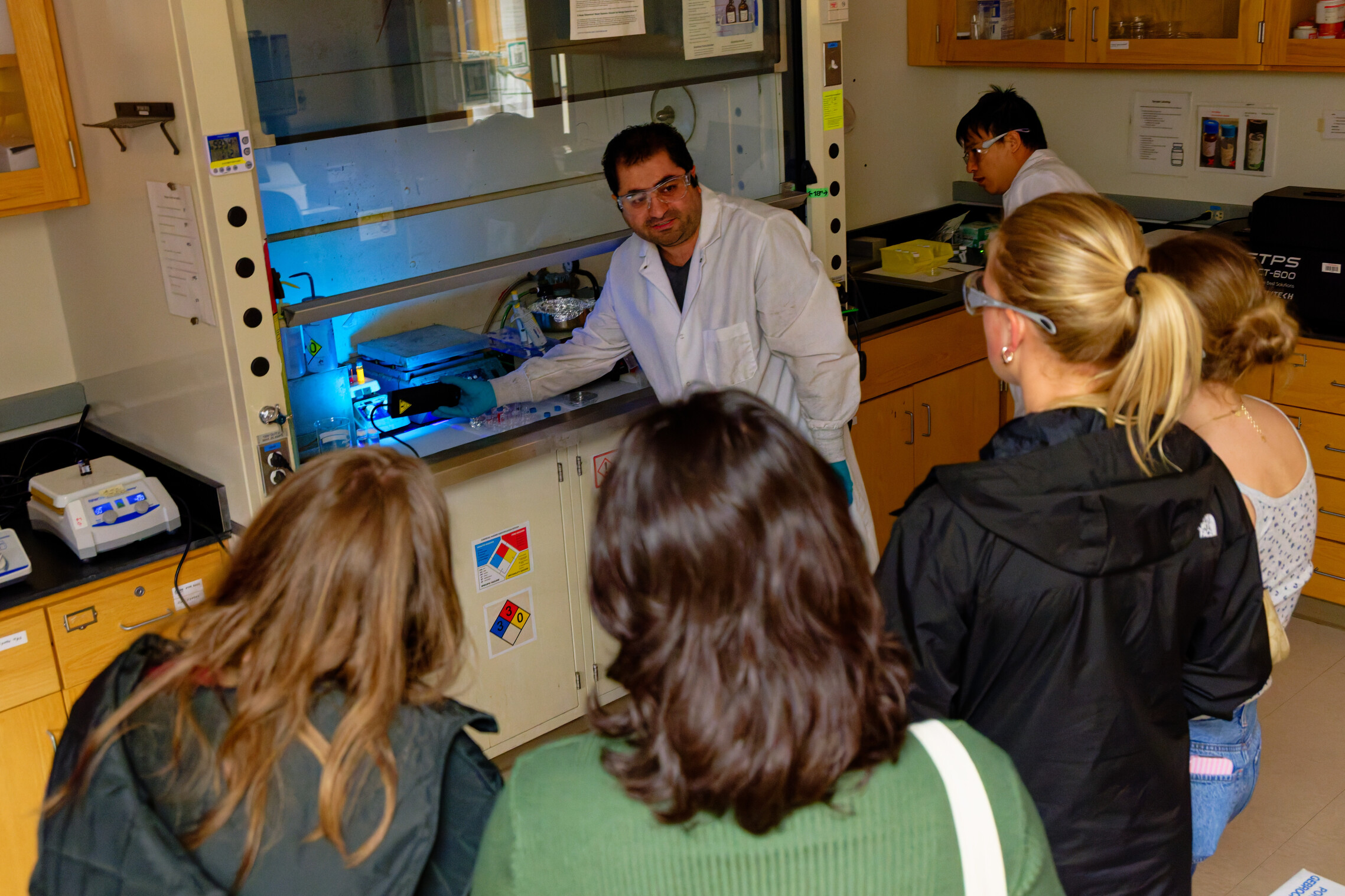 Students observing fluorescence